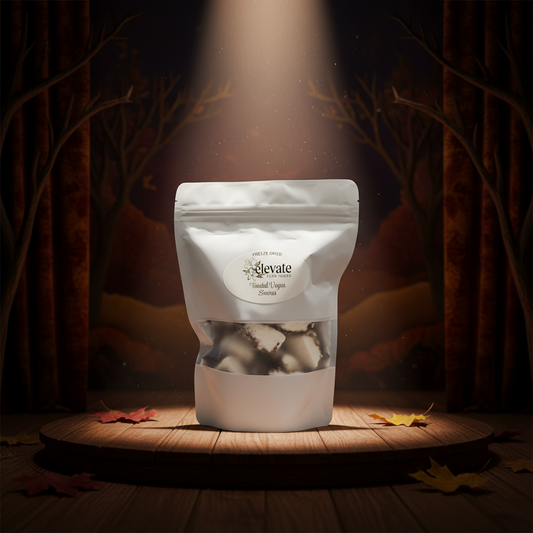 Gray packaging of freeze-dried vegan snacks with 'Elevate' branding on a white background